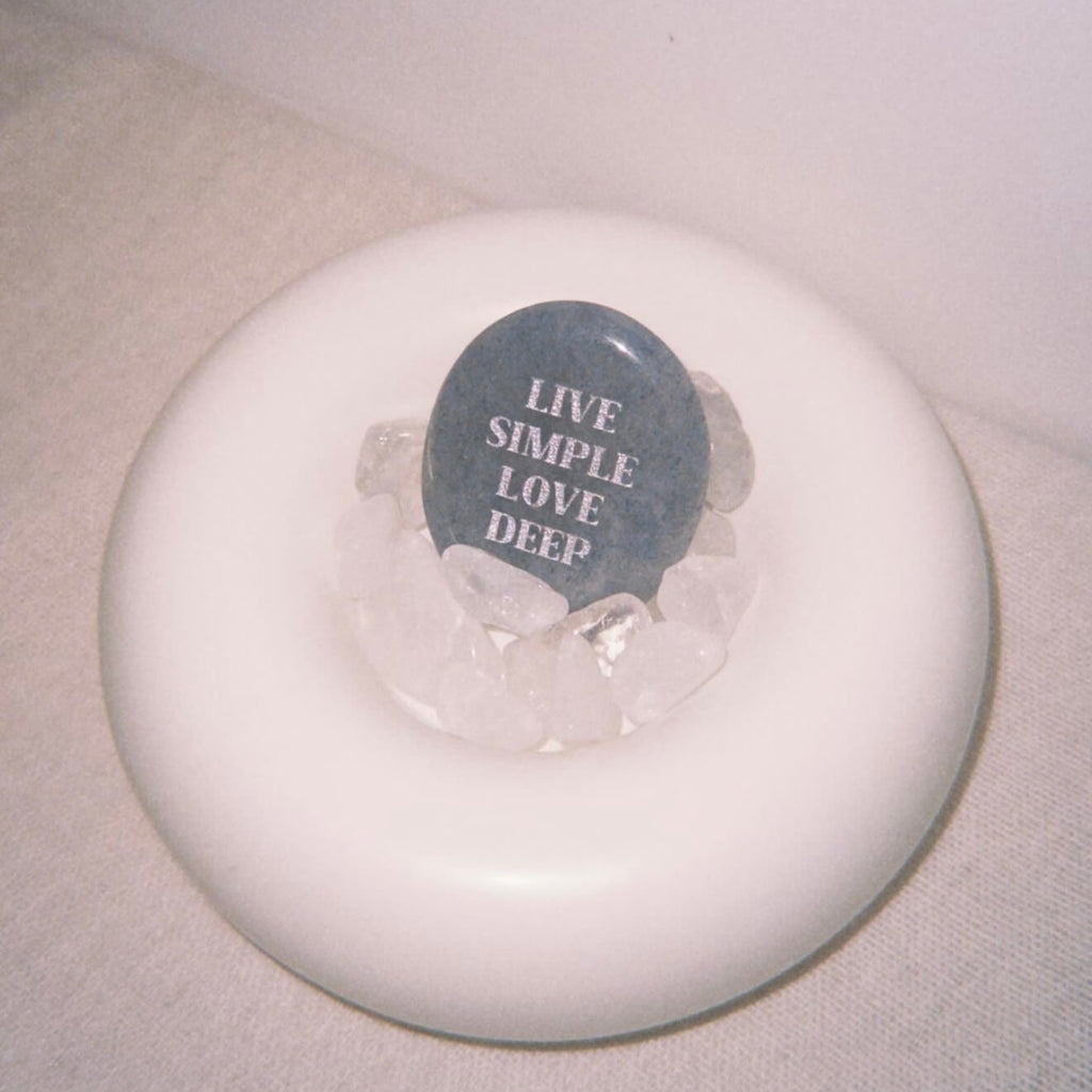 CIRCLEARA "Live Simple, Love Deep" etched Blue Dumortierite stone. A tactile calming mineral designed for the "Soulful Minimalist," serving as an anchor of patience and intentional living.