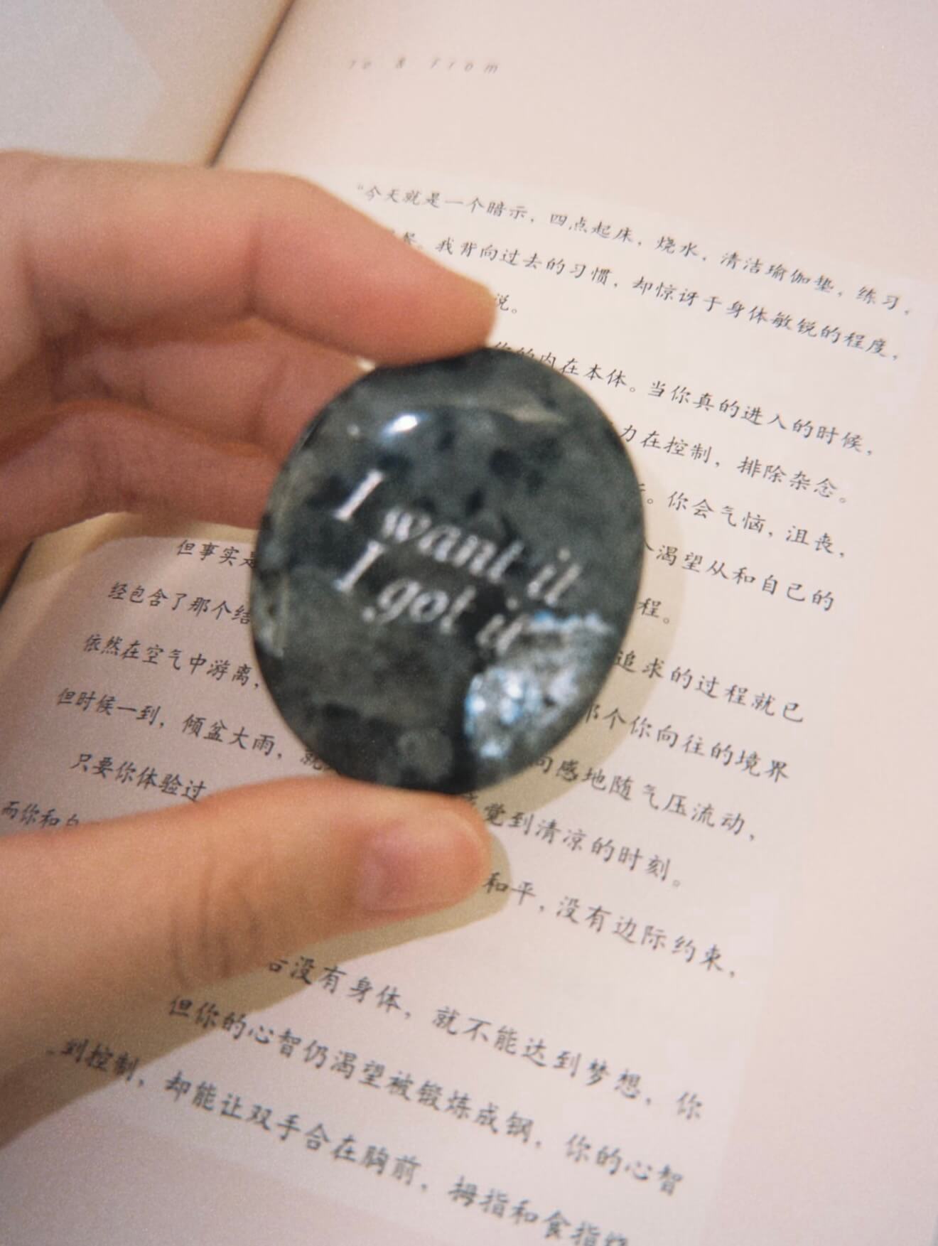 CIRCLEARA "I want it, I got it" etched Labradorite stone. A manifestation tool for ambition and focus, featuring the stone's signature mystical glow and gold-leaf vow.