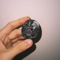 CIRCLEARA "I want it, I got it" etched Labradorite stone. A manifestation tool for ambition and focus, featuring the stone's signature mystical glow and gold-leaf vow.