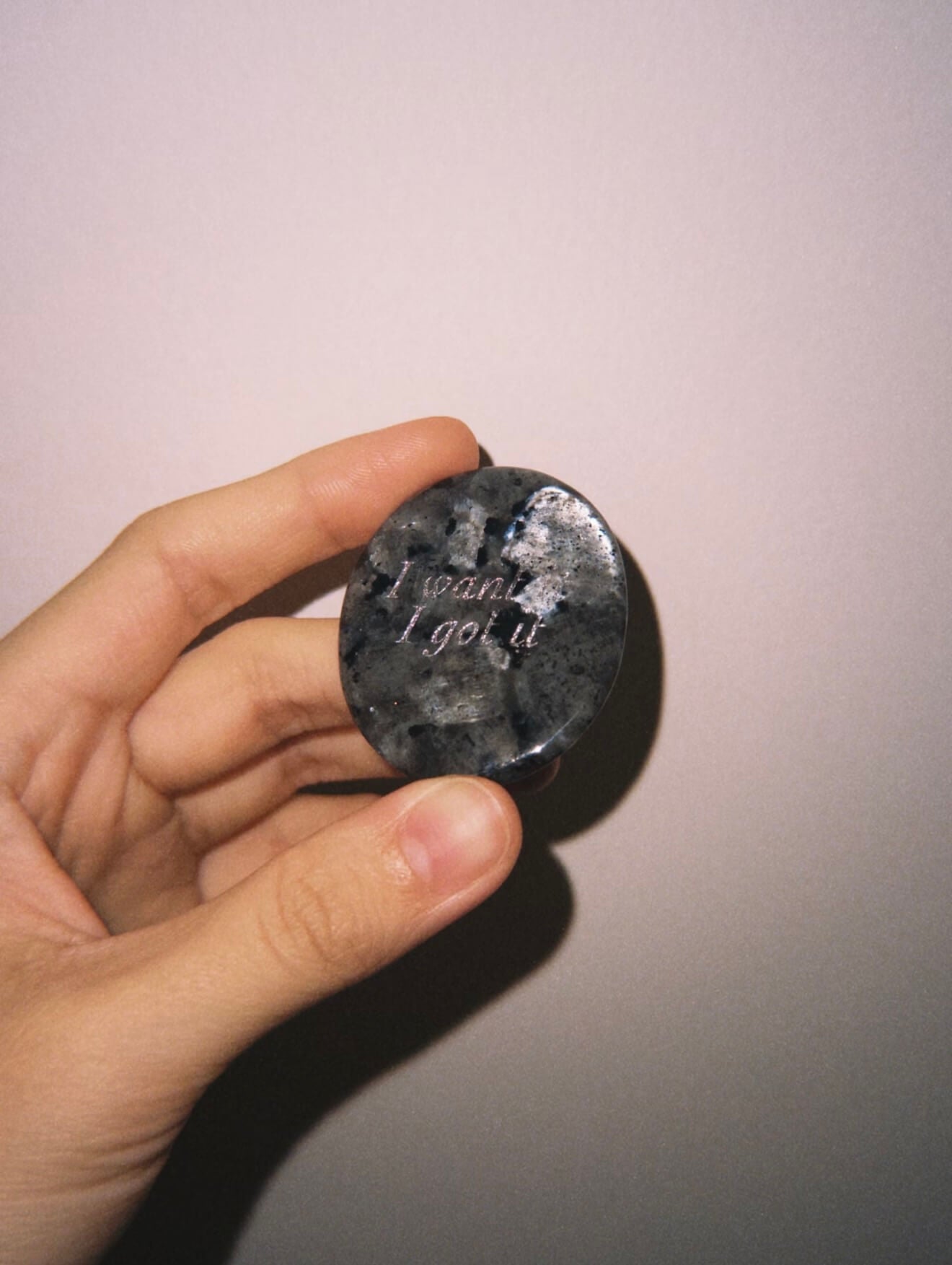 CIRCLEARA "I want it, I got it" etched Labradorite stone. A manifestation tool for ambition and focus, featuring the stone's signature mystical glow and gold-leaf vow.