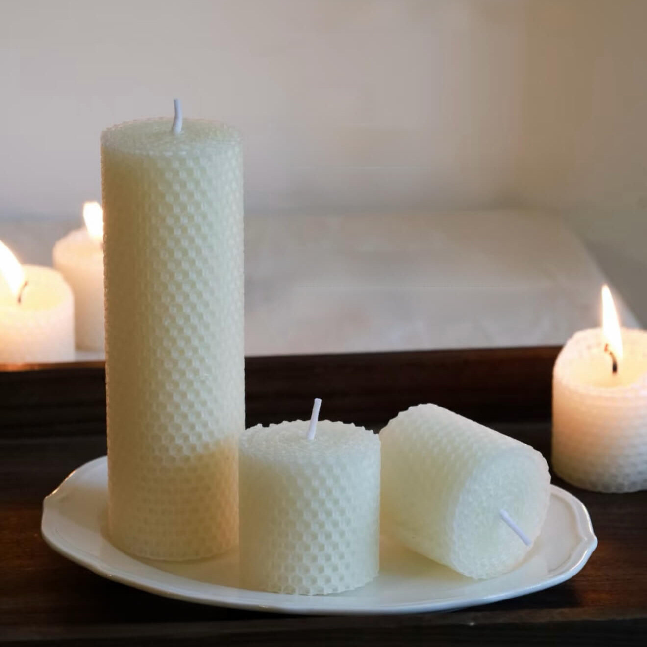 Handcrafted Pure Alabaster white beeswax honeycomb candle set by CIRCLEARA, featuring textured geometric pillar candles lit on a minimalist zen background for meditation.
