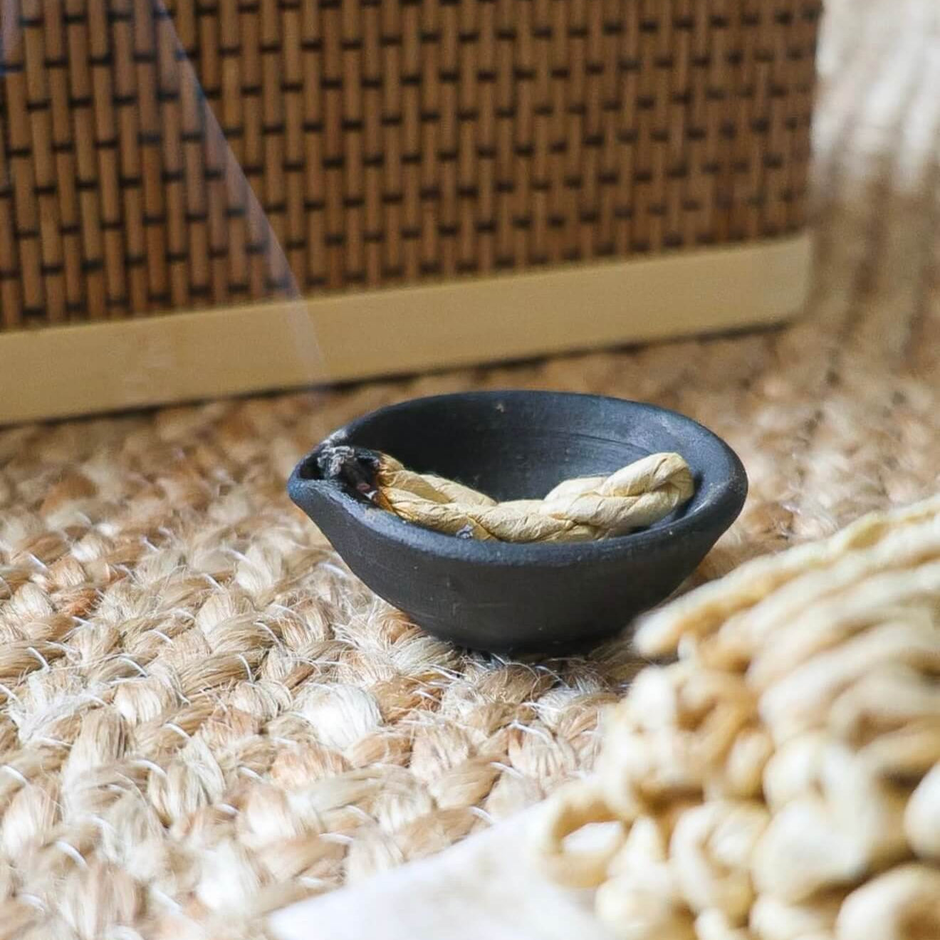 A bundled stack of CIRCLEARA Himalayan rope incense wrapped in raw paper, showcasing the traditional Nepalese hand-rolled texture.