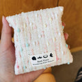 Visual display of rose petals, cinnamon sticks, and citrus peel, highlighting the natural botanical formula of the Fire Ember sachet.