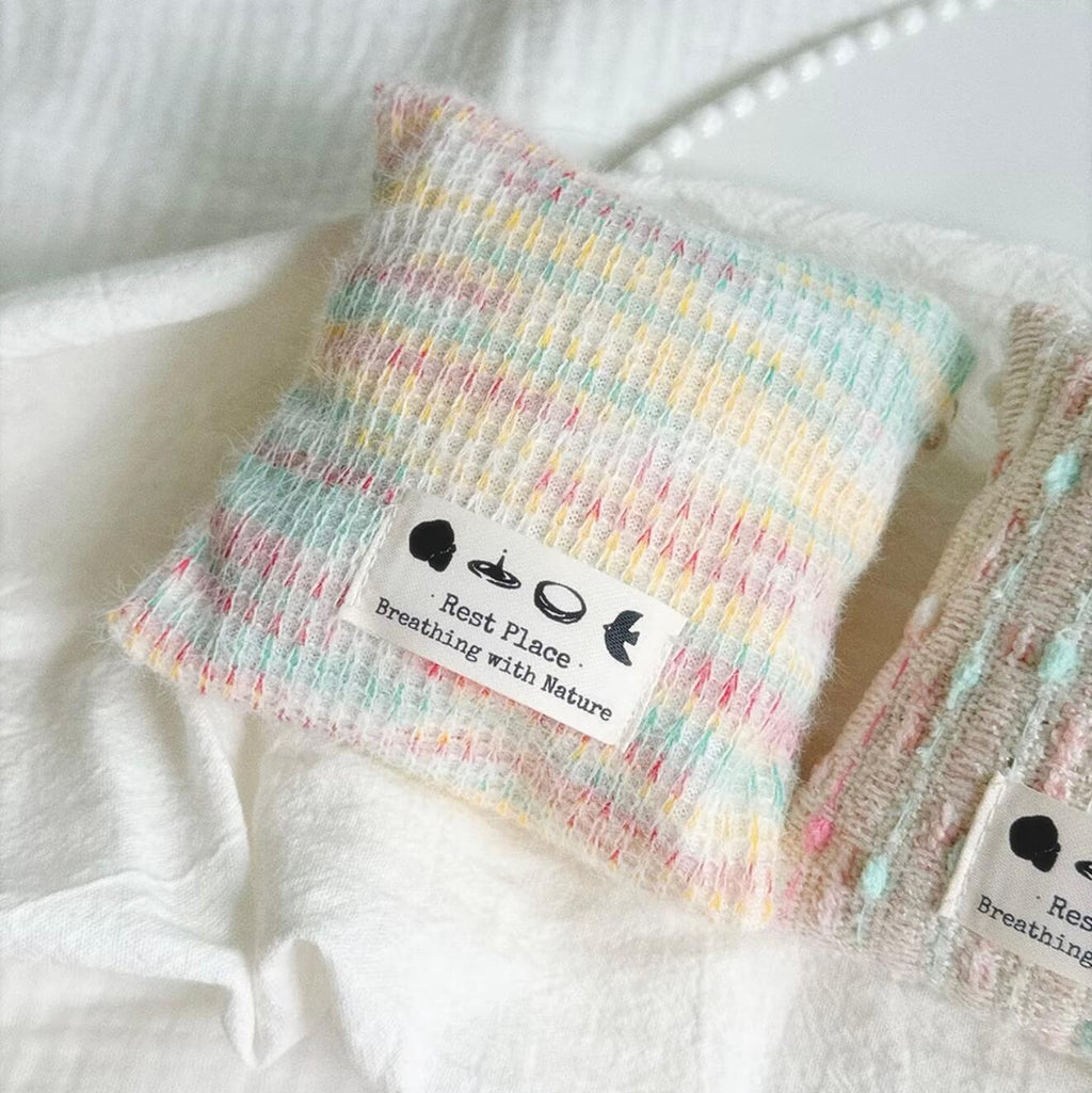 Handcrafted Earth Haven herbal balance sachet by CIRCLEARA, featuring a multi-color artisan woven pouch filled with premium natural lavender and cedarwood botanical herbs.