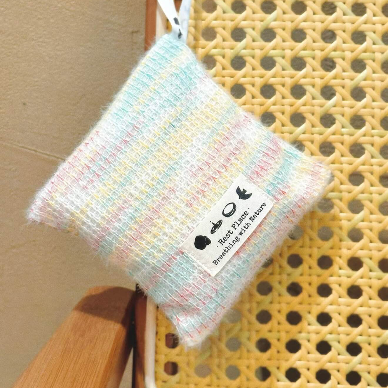 Handcrafted Earth Haven herbal balance sachet by CIRCLEARA, featuring a multi-color artisan woven pouch filled with premium natural lavender and cedarwood botanical herbs.