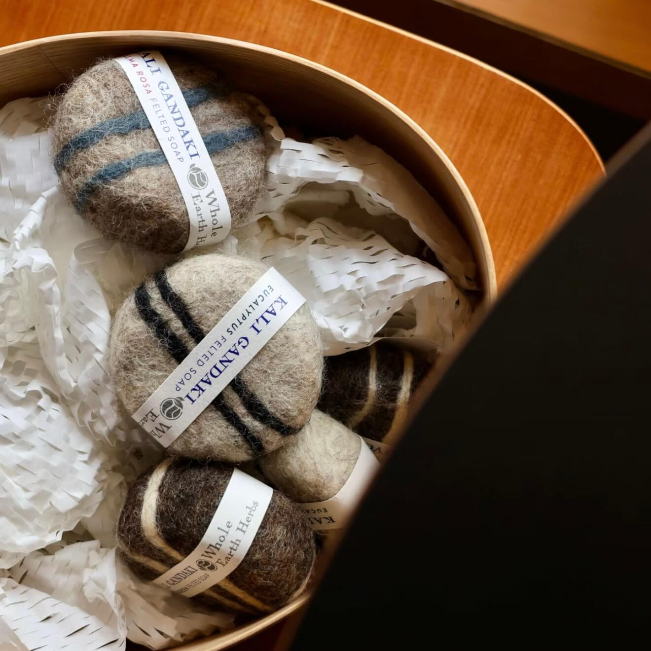 Close-up of the Kali Gandaki felted soap with striped wool patterns, highlighting the raw texture and artisanal Himalayan craftsmanship.