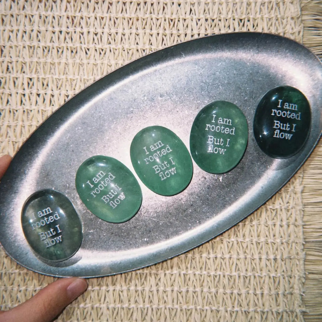 CIRCLEARA "I am rooted, But I flow" etched Green Aventurine stone. A tactile grounding mineral for heart chakra stability and navigating life's transitions.