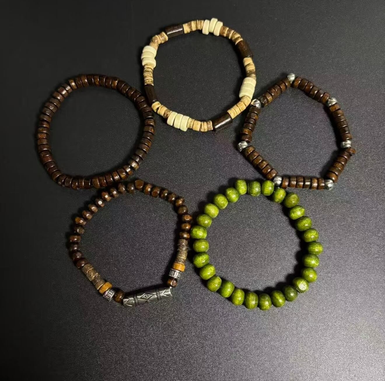 CIRCLEARA Terrane Nomadic Stack: 5-piece wooden bead bracelet set in forest green and charcoal. A minimalist grounding gift for couples and nature lovers.
