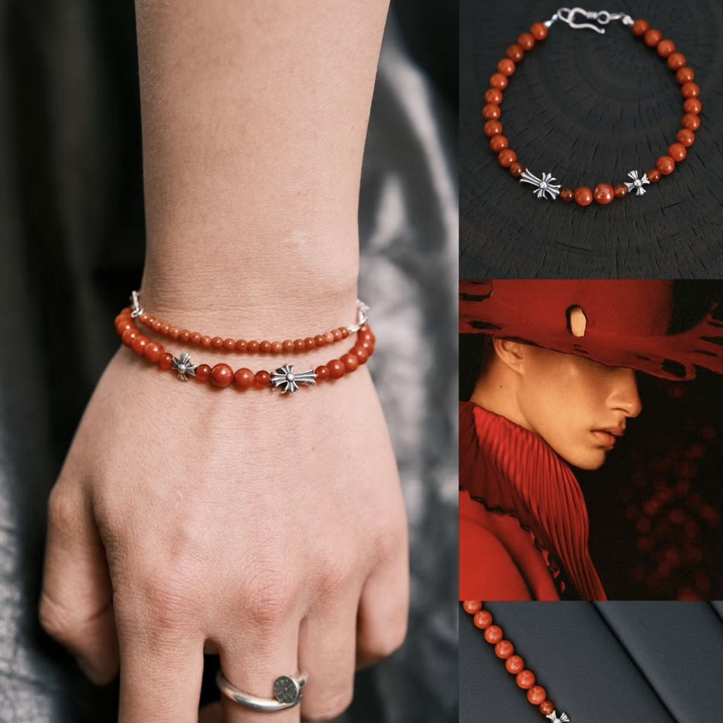Handcrafted 6.3mm natural cherry-red Nanhong agate beaded bracelet with a 925 sterling silver vintage sunburst charm worn on a wrist, by CIRCLEARA.