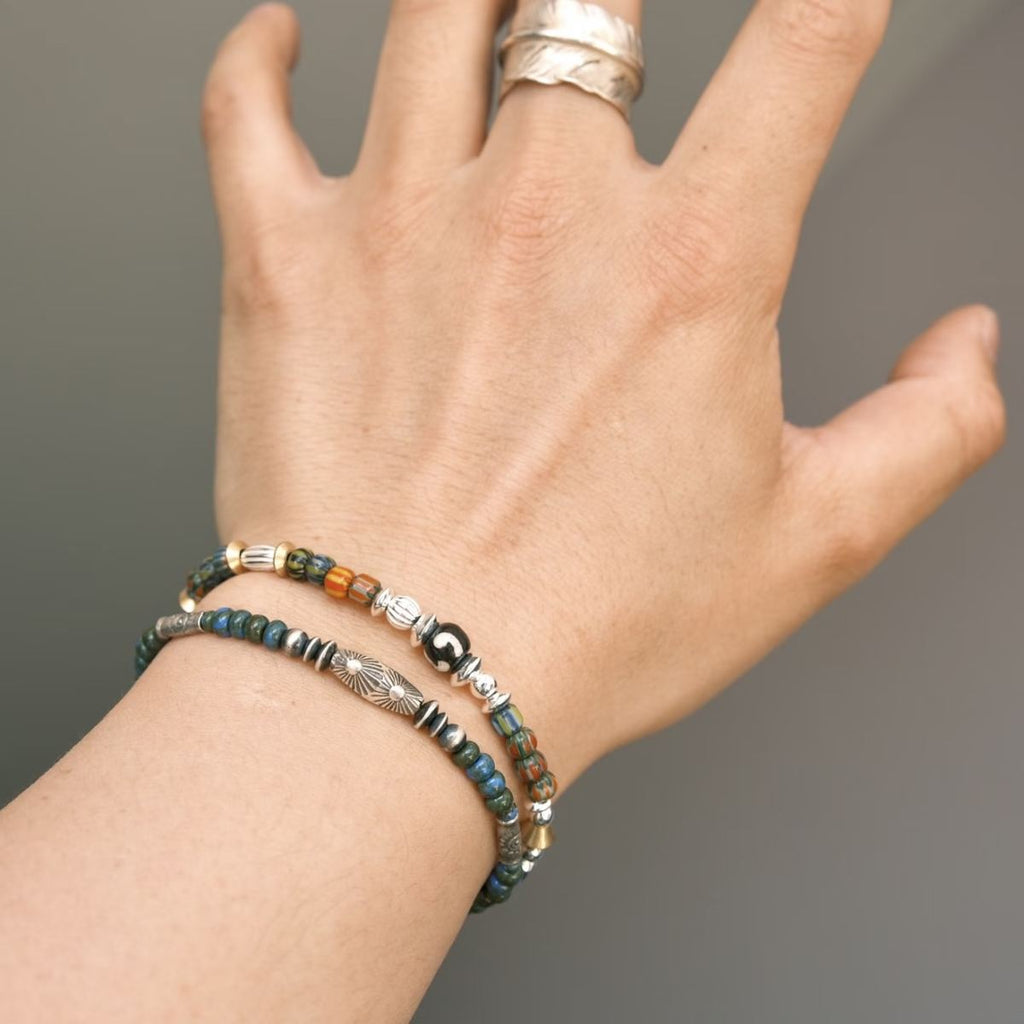 Handcrafted 6.3mm natural cherry-red Nanhong agate beaded bracelet with a 925 sterling silver vintage sunburst charm, by CIRCLEARA.