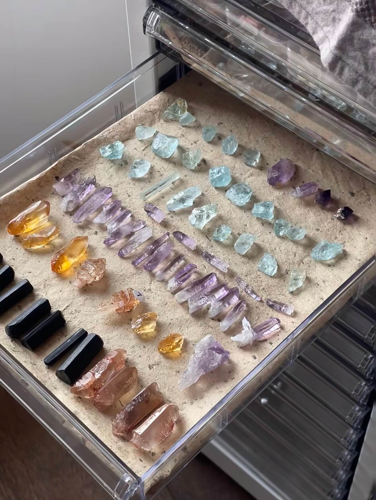 Raw natural crystals and affirmation stones for portable mindfulness, sensory grounding, and reclaiming personal peace during a busy day.